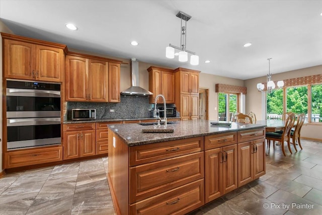 1122 Souders Ave, Elburn, IL 60119 - kitchen with wall chimney exhaust hood, stainless steel appliances, backsplash, a sink, and dark stone countertops