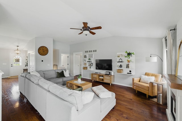 4783 W Iris Ln, Monee, IL 60449 - living room with ceiling fan, dark wood-style floors, lofted ceiling, and baseboards
