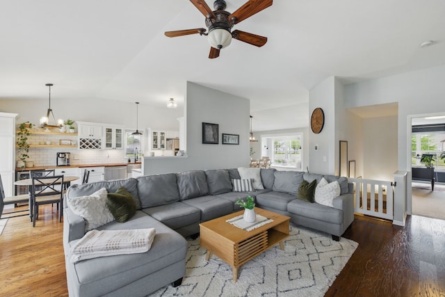 4783 W Iris Ln, Monee, IL 60449 - living area featuring a chandelier, lofted ceiling, light wood finished floors, and a ceiling fan