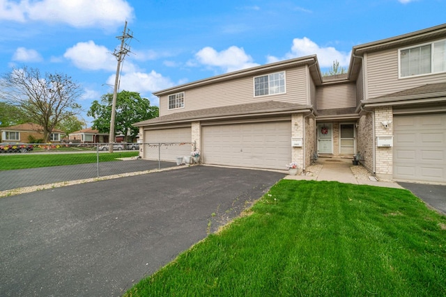 14603 Maple Ln, Dolton, IL 60419 - multi unit property featuring asphalt driveway, an attached garage, and brick siding