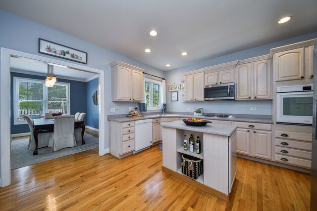 507 Prairieview Pkwy, Hampshire, IL 60140 - kitchen with white appliances, healthy amount of natural light, light wood-style flooring, and recessed lighting