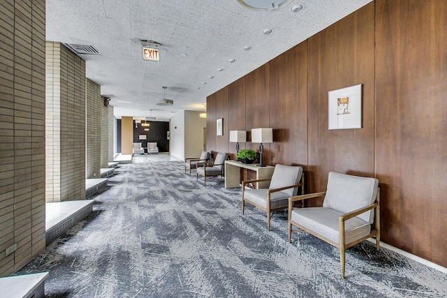 community lobby with wooden walls