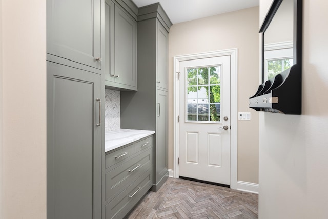doorway with baseboards