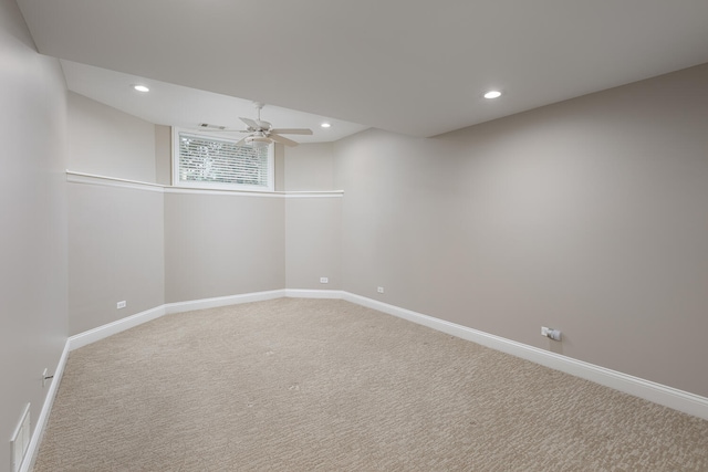 basement with baseboards, carpet floors, recessed lighting, and ceiling fan
