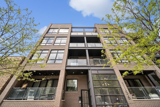 1156 W Ohio St Unit 4E, Chicago, IL 60642 - view of apartment building / complex
