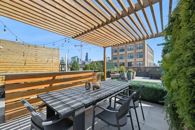 1156 W Ohio St Unit 4E, Chicago, IL 60642 - view of patio with a view of skyline, outdoor dining area, and a pergola