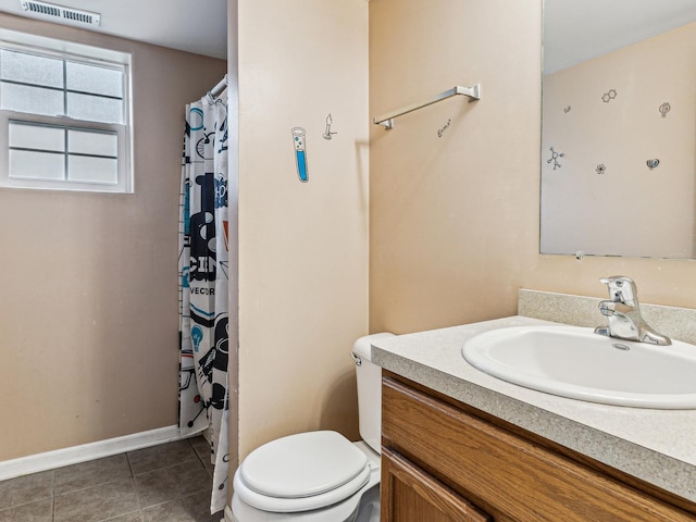 full bathroom featuring vanity, toilet, tile patterned floors, and curtained shower