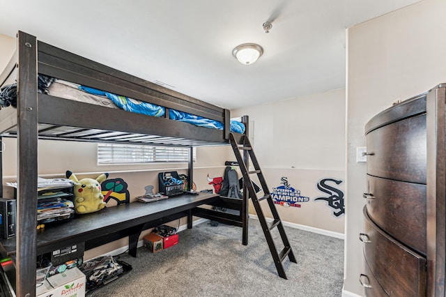 carpeted bedroom with baseboards
