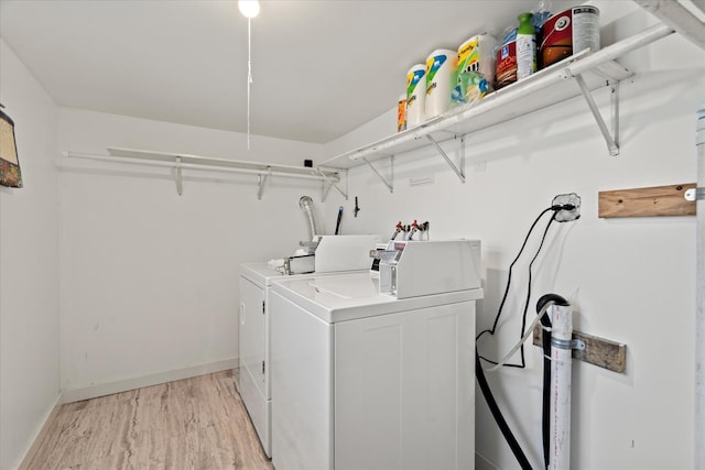 6508 S Albany Ave, Chicago, IL 60629 - shared laundry featuring separate washer and dryer, light wood finished floors, and baseboards