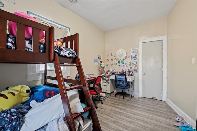 6508 S Albany Ave, Chicago, IL 60629 - bedroom with wood finished floors, a desk, and baseboards