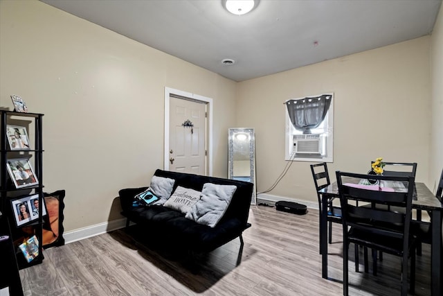6508 S Albany Ave, Chicago, IL 60629 - living room featuring light wood-style flooring, baseboards, and cooling unit