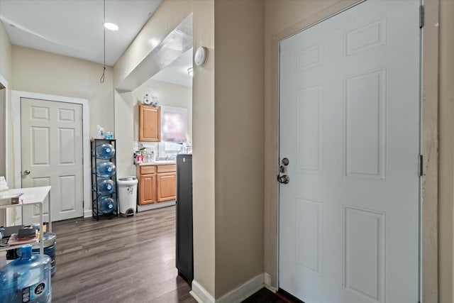6508 S Albany Ave, Chicago, IL 60629 - foyer with dark wood-type flooring and baseboards