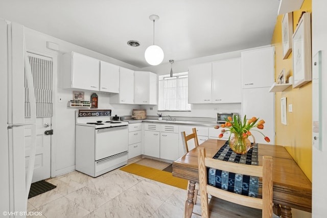 5728 S Stony Island Ave Unit 1, Chicago, IL 60637 - kitchen featuring white appliances, white cabinets, pendant lighting, light countertops, and a sink
