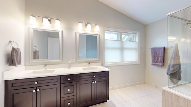 2030 N Oak Wood Dr, Arlington Heights, IL 60004 - bathroom with vaulted ceiling, tiled shower, double vanity, and tile patterned floors