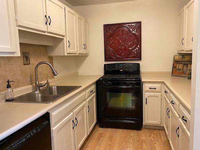 2211 S Highland Ave Unit 4B, Lombard, IL 60148 - corridor with light wood-style floors and a wall mounted AC