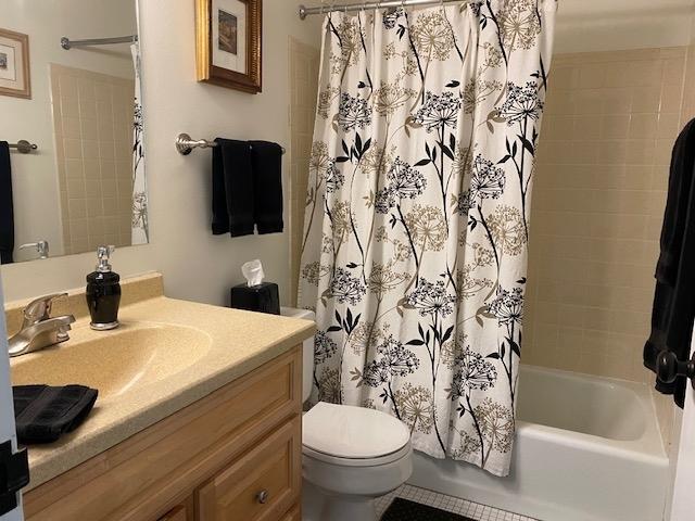 2211 S Highland Ave Unit 4B, Lombard, IL 60148 - carpeted bedroom featuring baseboard heating and a wall unit AC