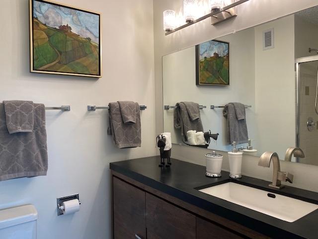 2211 S Highland Ave Unit 4B, Lombard, IL 60148 - office area with wood finished floors, a textured ceiling, and a wall mounted AC