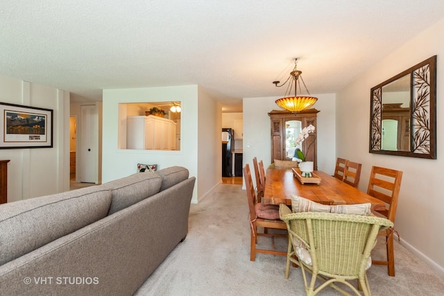 2211 S Highland Ave Unit 4B, Lombard, IL 60148 - dining area featuring light colored carpet and baseboards