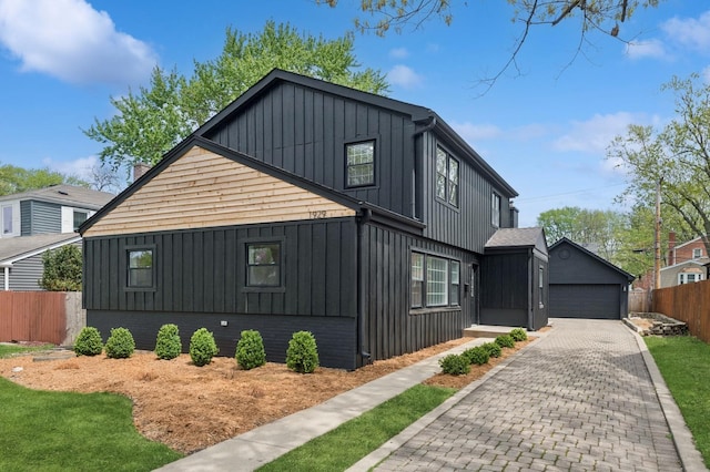 1929 S Ashland Ave, Park Ridge, IL 60068 - view of property exterior featuring fence, board and batten siding, and a garage