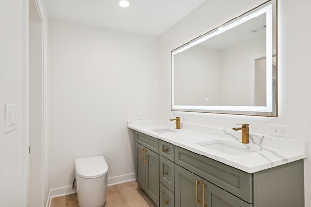1929 S Ashland Ave, Park Ridge, IL 60068 - full bathroom featuring double vanity, baseboards, recessed lighting, and toilet