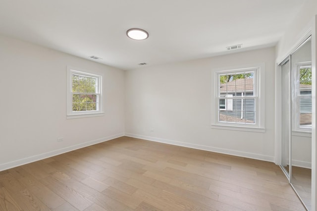 1929 S Ashland Ave, Park Ridge, IL 60068 - spare room with light wood-type flooring, healthy amount of natural light, and baseboards