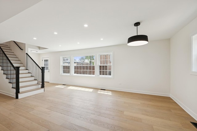 1929 S Ashland Ave, Park Ridge, IL 60068 - unfurnished living room with stairway, light wood-type flooring, baseboards, and recessed lighting