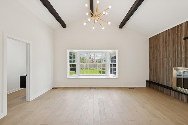 1929 S Ashland Ave, Park Ridge, IL 60068 - unfurnished living room featuring a chandelier, light wood-type flooring, and baseboards