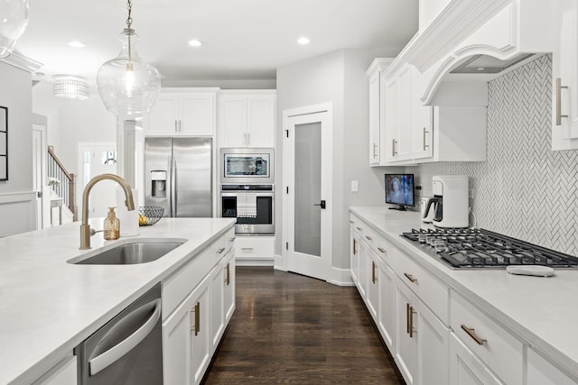 15175 Rodao Ln, Orland Park, IL 60467 - kitchen featuring stainless steel appliances, a sink, light countertops, white cabinets, and recessed lighting