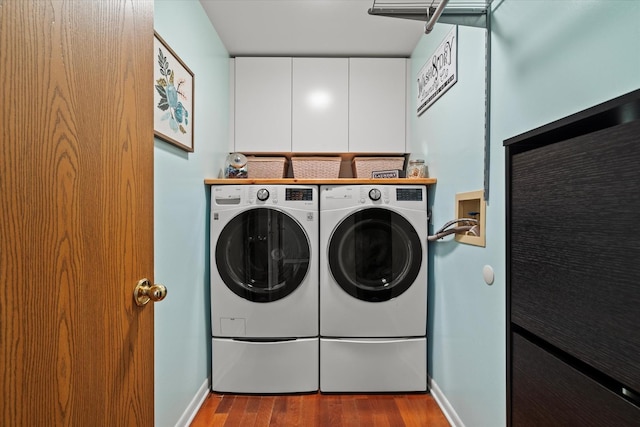 638 E Princeton Ct, Round Lake Beach, IL 60073 - laundry room with washer and clothes dryer, wood finished floors, and cabinet space