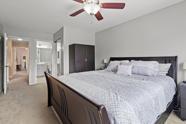 638 E Princeton Ct, Round Lake Beach, IL 60073 - bedroom with light carpet, ceiling fan, and ensuite bathroom