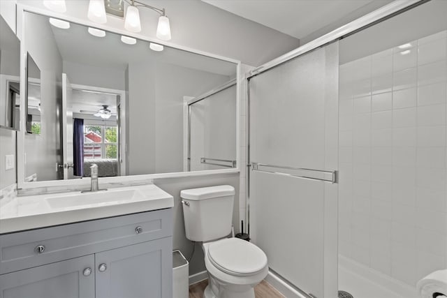 638 E Princeton Ct, Round Lake Beach, IL 60073 - bathroom with vanity, a stall shower, a ceiling fan, and ensuite bathroom