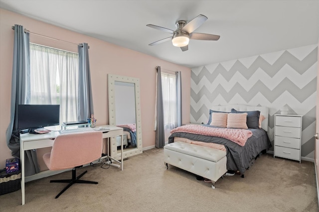 638 E Princeton Ct, Round Lake Beach, IL 60073 - carpeted bedroom with an office area, ceiling fan, and an accent wall