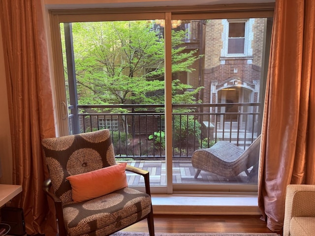 4722 N Beacon St Unit 1E, Chicago, IL 60640 - doorway to outside featuring wood finished floors