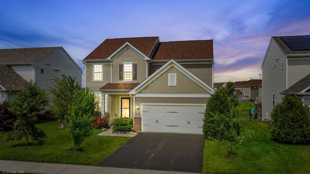 3471 Birch Ln, Naperville, IL 60564 - traditional-style house with board and batten siding, asphalt driveway, a front lawn, a garage, and brick siding