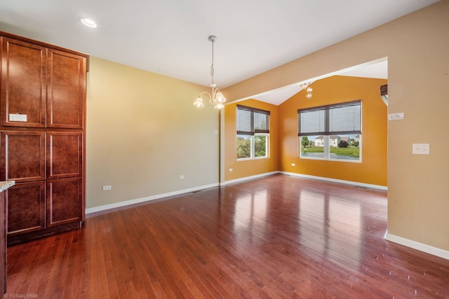 3471 Birch Ln, Naperville, IL 60564 - spare room featuring a chandelier, vaulted ceiling, dark wood finished floors, and recessed lighting