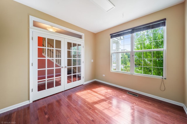 3471 Birch Ln, Naperville, IL 60564 - empty room featuring french doors and hardwood / wood-style flooring