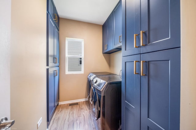 3471 Birch Ln, Naperville, IL 60564 - washroom with washing machine and dryer, cabinet space, and light wood-style floors