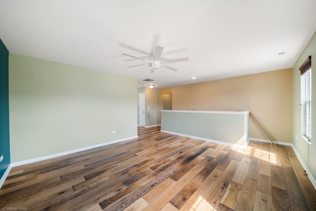 3471 Birch Ln, Naperville, IL 60564 - empty room with wood finished floors and a ceiling fan