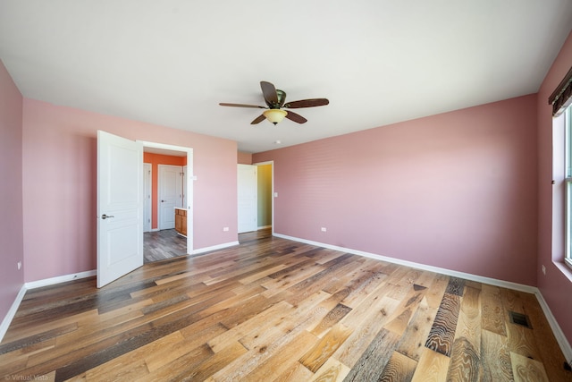 3471 Birch Ln, Naperville, IL 60564 - unfurnished bedroom with wood finished floors, ceiling fan, and ensuite bathroom