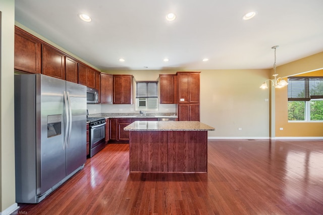 3471 Birch Ln, Naperville, IL 60564 - kitchen with stainless steel appliances, a chandelier, dark wood-style flooring, a kitchen island, and recessed lighting