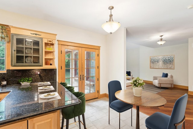 557 Signal Hill Rd, North Barrington, IL 60010 - dining area featuring french doors and baseboards