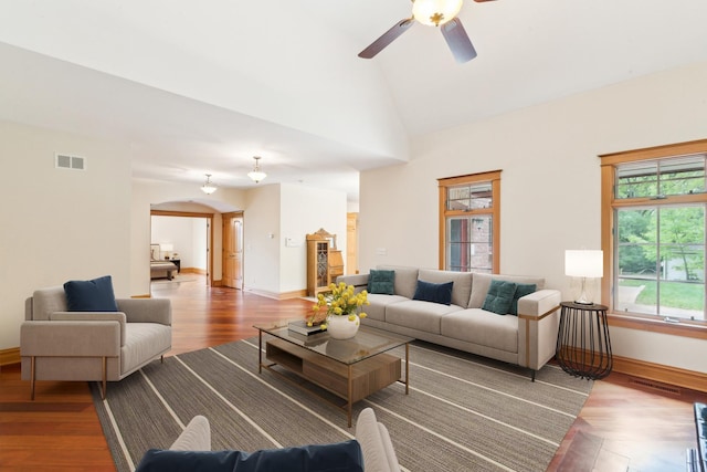 557 Signal Hill Rd, North Barrington, IL 60010 - living area with baseboards, ceiling fan, lofted ceiling, wood finished floors, and arched walkways