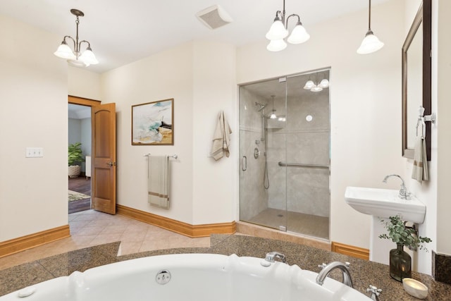 557 Signal Hill Rd, North Barrington, IL 60010 - bathroom with radiator heating unit, a stall shower, a chandelier, a garden tub, and a sink
