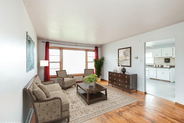 172 Strieff Ave, Chicago Heights, IL 60411 - living area with light wood finished floors and baseboards