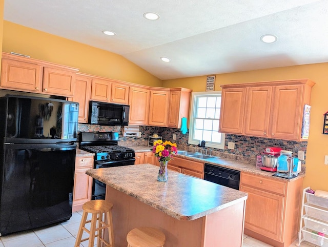 72 Astoria Way, Bloomington, IL 61704 - kitchen with black appliances, light brown cabinets, a sink, light tile patterned floors, and vaulted ceiling