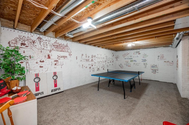 72 Astoria Way, Bloomington, IL 61704 - recreation room with brick wall and carpet floors