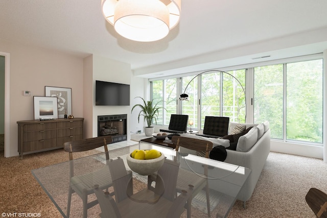 2525 Wellington Ct Unit 307, Evanston, IL 60201 - living room featuring plenty of natural light, light carpet, and a fireplace