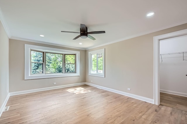 unfurnished bedroom with ornamental molding, baseboards, light wood-type flooring, and recessed lighting