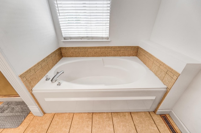 353 Evening Star Ct Unit 353, Bolingbrook, IL 60440 - bathroom featuring a bath and tile patterned floors