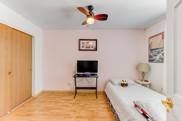 353 Evening Star Ct Unit 353, Bolingbrook, IL 60440 - bedroom featuring light wood-style flooring, a closet, ceiling fan, and baseboards